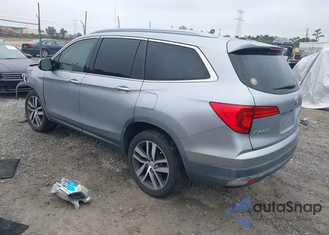 2017 Honda Pilot Touring z USA, uszkodzony, nr VIN 5FNYF5H90HB030940